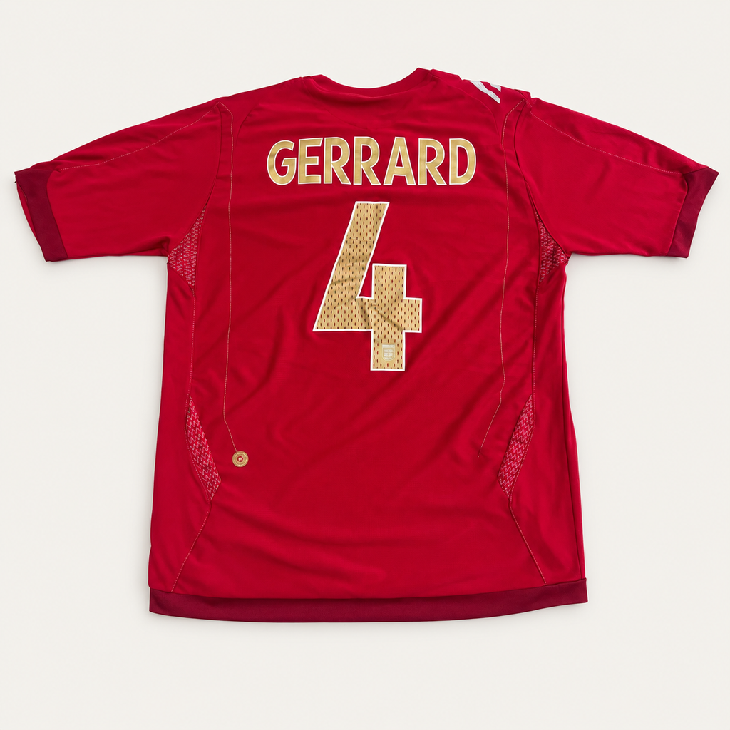 A red short-sleeve sports jersey shown flat against a light gray background, with 'GERRARD' and the number '4' in gold lettering on the back.